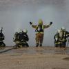 White helmets extinguishing fire 